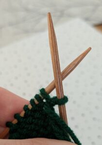 casting on purlwise at beginning of row