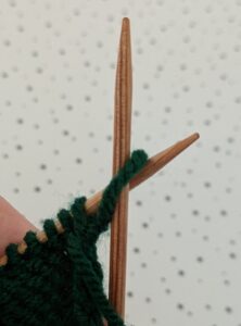 casting on purlwise at beginning of row