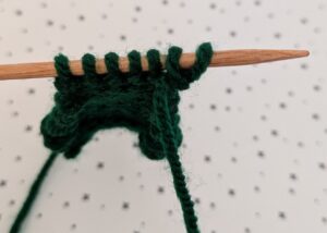 casting on purlwise at beginning of row