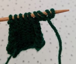 casting on purlwise at beginning of row